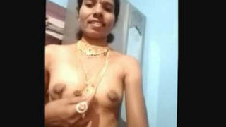 A Telugu aunty flaunts her big boobs and pussy in traditional jewellery