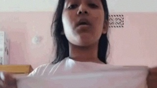 Naughty Indian girl strips and teases in free video