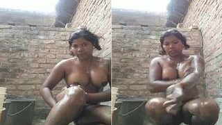 Exclusive desi girl's outdoor bathing in a village