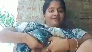 Local Indian woman flaunts her big breasts and hairy buttocks in solo video