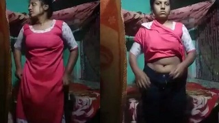 Country girl records a video for her lover in a village