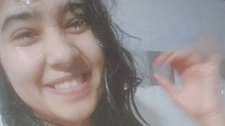 Nude Indian teen takes a bathroom selfie in see-through bra