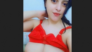 Stunning Indian girl with big boobs in a steamy video