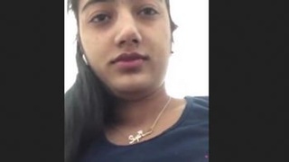 Desi wife with nice boobs flaunts her assets in a video