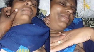 Tamil aunty gets her boobs pressed and stripped down