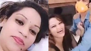Desi couple's threesome in a hotel room with sex toys