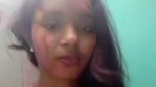 Desi girl strips naked after Holi festival in sexy video