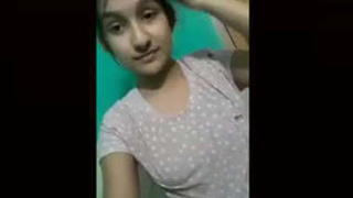 Beautiful desi girl shows off and pleasures herself in new video