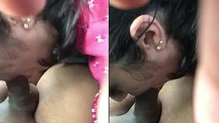 A Nigerian girl performs a blowjob in this video