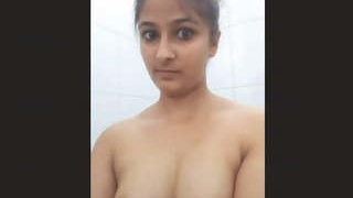 Punjabi girl flaunts her cute boobs in a solo video