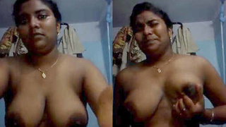 Tamil teen squeezes her breasts with a seductive look
