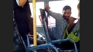 A man masturbates on a bus while being filmed by the female driver