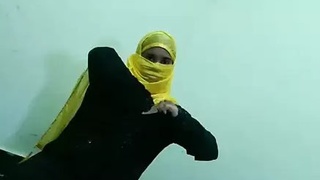 A Muslim girl in a hijab shows off her doggy style skills in this hot video