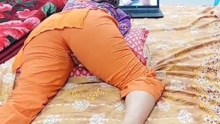 Indian college girl has intense orgasm while watching porn on laptop