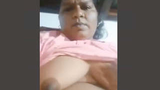Mature Indian woman stripping and showing off her naked body